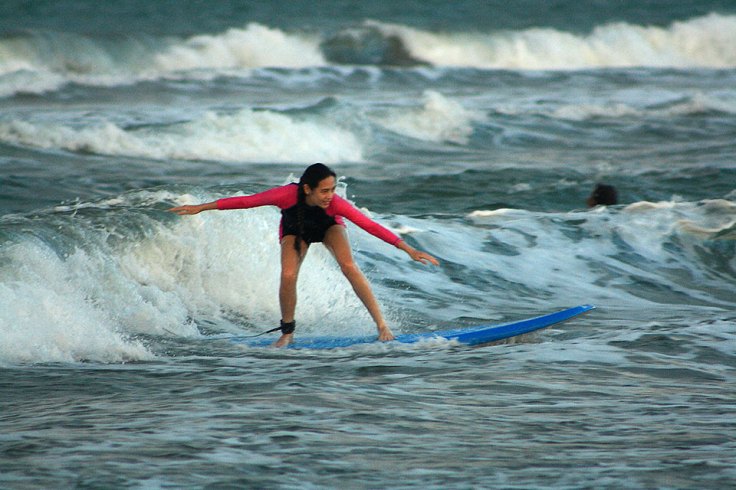 surfer at Sabang Beach, Baler