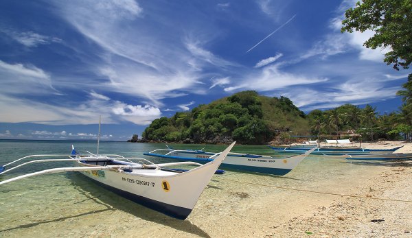 boats on a beach at Alad Island