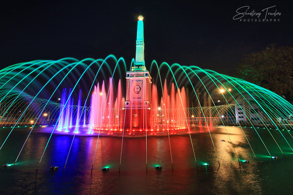 Anda Monument with its circular fountain and colorful LED lights